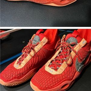 Size 10.5. Nike shoe. Red/orange/salmon color. Used great condition. Worn little